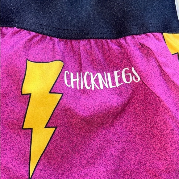Vibrant Purple and Yellow Athletic Shorts with Lightning Pattern - Picture 8 of 9